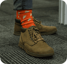 A pair of Dotsure themed socks.