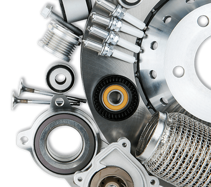 a photo of a collection of shiny gears and motor engine parts stacked upon each other